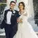 man in black suit and woman in white wedding dress